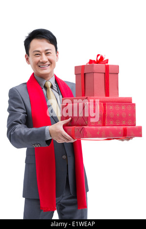 Fröhliche Geschäftsmann mit Geschenken feiern Chinese New Year Stockfoto