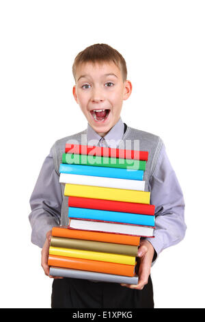 Junge hält die Bücherstapel Stockfoto