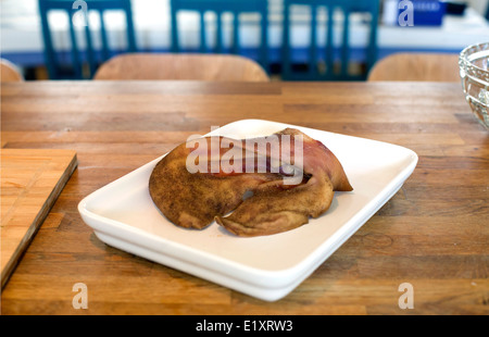 Schweine Ohr Delikatesse Essen Gericht Schweinefleisch kochen cook Stockfoto