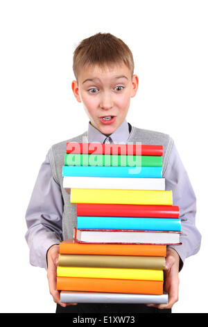 Junge hält die Bücherstapel Stockfoto