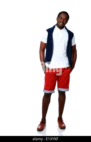 In voller Länge Portrait von ein lächelnder afrikanischen Mann auf weißem Hintergrund Stockfoto