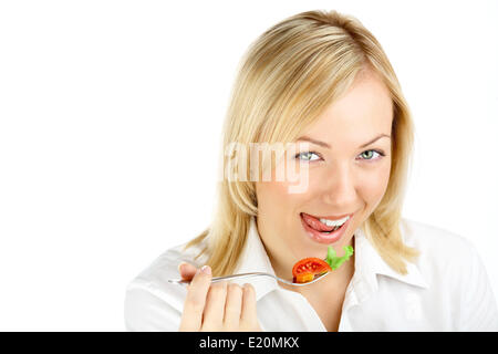 Eine Blondine leckt Lippen Stockfoto