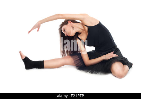 Ballett-Tänzerin im schwarzen Kleid, Übungen Stockfoto