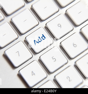 Foto hinzufügen Schaltfläche "Freund" auf der weißen Tastatur. Stockfoto