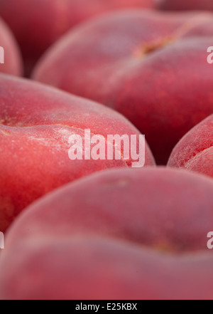 Flache donut Pfirsiche essen Hintergrund Stockfoto