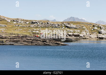 Wandern auf dem Plateau des Emparis, Lac Noir 2431m, Massif de l'Oisans, Naturpark Les Ecrins, Isère, Rhône-Alpes, Frankreich. Stockfoto