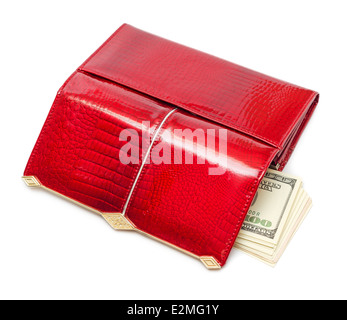 Dollar in die rote Handtasche isoliert auf weißem Hintergrund Stockfoto