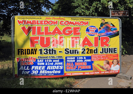 Wimbledon Common, London SW19 UK. 21. Juni 2014. Der Wimbledon Village Fair ist eine jährliche Veranstaltung, die mehr als 20.000 Besucher anzieht. Alle Gelder werden verwendet, um lokale gemeinnützige Projekte zu unterstützen. Es ist ein toller Tag für die Familie mit Highlights wie ein Reitturnier, Ponyreiten, Stände verkaufen eine Vielzahl von Gütern, live-Musik und ein Jahrmarkt. Bildnachweis: Julia Gavin/Alamy Live-Nachrichten Stockfoto