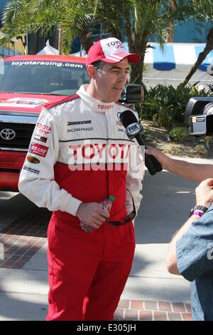 Prominente teilnehmen am Celeb/Pro Rennen auf der Grand Prix von Long Beach Featuring: Adam Carolla Where: Long Beach, Kalifornien, USA bei: 19. April 2013 Stockfoto