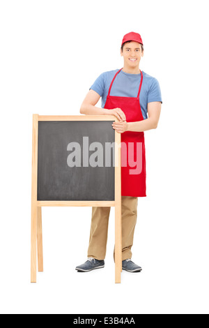 Mann im Vorfeld stehen hinter einer Tafel Stockfoto