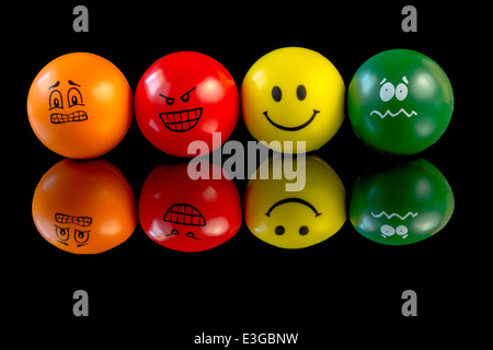 Glücklich, traurig und verwirrt Stress Ball Gesichter Stockfoto