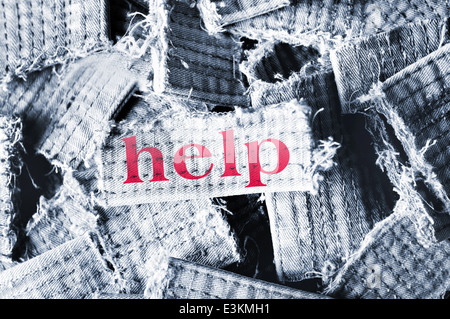 Wort auf materielle Hilfe Stockfoto