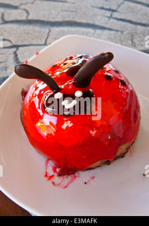 Einen Kuchen in der Form von Marienkäfer Stockfoto