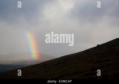 Regenbogen über der Galloway Forest Park aus den Rhinns von Kells, Dumfries and Galloway, Schottland Stockfoto