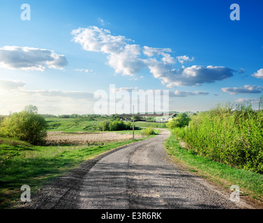 Country road in the countryside at sunset Stockfoto