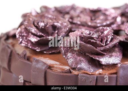 schöne Schokoladenkuchen mit rosa Glitzer Rosen Stockfoto