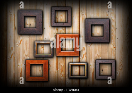 Braun und Beige leeren Bilderrahmen hängen Holzwand für Ihre Nachricht Stockfoto