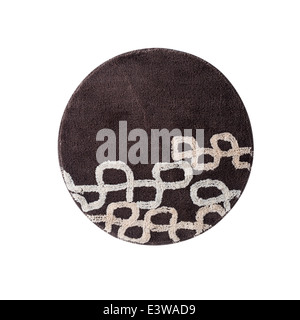 eine Runde braunen Teppich isoliert auf weißem Hintergrund Stockfoto
