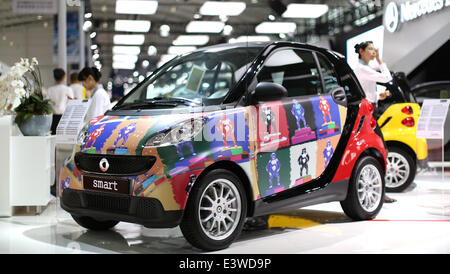 Shengyang, Chinas Liaoning Provinz. 30. Juni 2014. Ein Smart Auto erscheint 2014 China (Shenyang) Auto Industry Expo in Shenyang, Hauptstadt des nordöstlichen Chinas Liaoning Provinz, 30. Juni 2014. Hier zeigen die 6-Tage-Auto am Montag beendet. © Yao Jianfeng/Xinhua/Alamy Live-Nachrichten Stockfoto