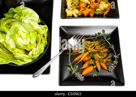 Glasierte Karotten ist eine köstliche Beilage zu einer Mahlzeit Stockfoto