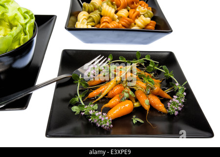 Glasierte Karotten ist eine köstliche Beilage zu einer Mahlzeit Stockfoto