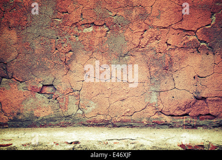 Alten verwitterten roten Betonmauer Textur Stockfoto