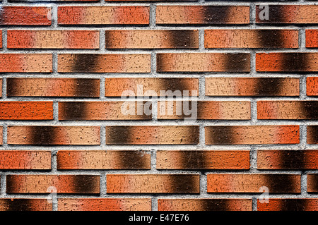 Hintergrund der Wand mit roten Ziegelsteinen Stockfoto