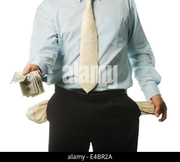 Der junge Geschäftsmann mit leeren Taschen Stockfoto
