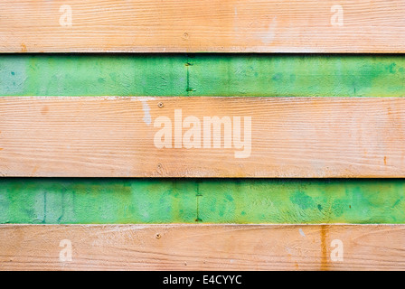 Schmutzig braunen grünen Holz Hintergrund / Textur. Stockfoto