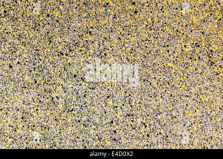 Gelb und schwarz laut Betonwand Hintergrund / Textur. Stockfoto