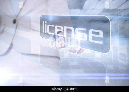 Geschäftsfrau auf Wort Lizenz Stockfoto