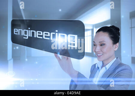 Geschäftsfrau auf Wort engineering Stockfoto