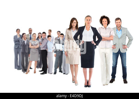 Zusammengesetztes Bild Business Teams Blick in die Kamera Stockfoto