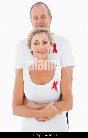 Älteres Paar, die Unterstützung von Aids-Aufklärung zusammen Stockfoto