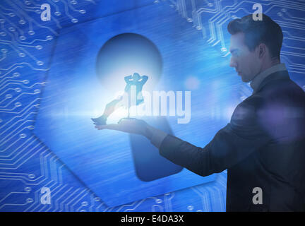 Zusammengesetztes Bild der Geschäftsmann hält Geschäftsmann in Drehstuhl Stockfoto