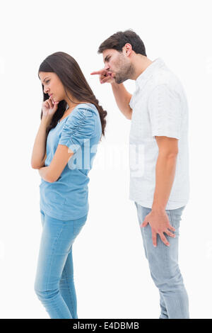 Verärgerter Mann schreien an Freundin Stockfoto