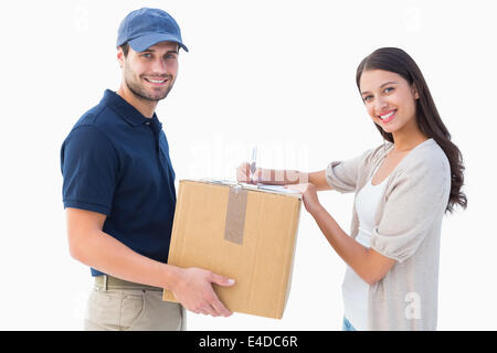 Happy Delivery Man mit Kunde Stockfoto