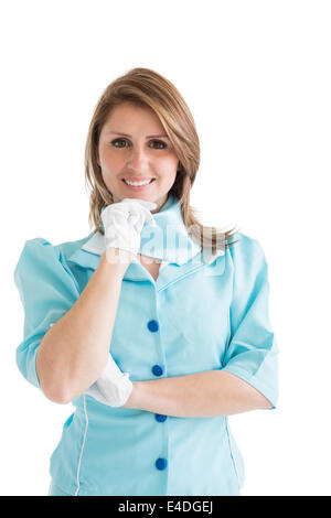 Schöne Stewardess in blauer Uniform gekleidet Stockfoto