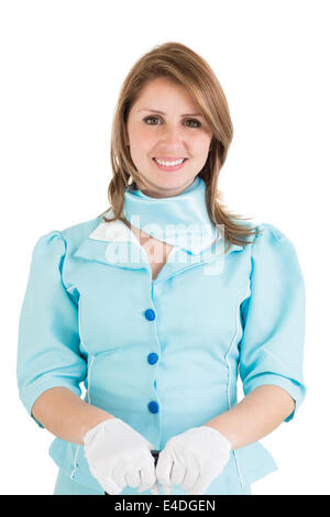 Schöne Stewardess in blauer Uniform gekleidet Stockfoto
