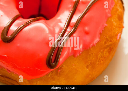 Strawberry frosted Donut closeup Stockfoto