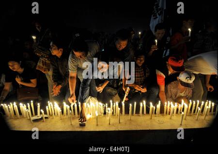 Jakarta, Indonesien. 11. Juli 2014. Indonesische Volk teilnehmen an "Solidarität für Palästina" zur Unterstützung Palästinas in Jakarta, Indonesien, 11. Juli 2014. Indonesischen Präsidenten Susilo Bambang Yudhoyono am Freitag forderte die israelische Regierung auf Militärschläge gegen den Gaza-Streifen zu beenden, das behauptet, hat Dutzend zivilen Lebens. Indonesien unterstützt seit langem die palästinensische Sache zum Einrichten eines unabhängigen Staates und hat keine diplomatische Beziehungen zu Israel. Bildnachweis: Agung Kuncahya B./Xinhua/Alamy Live-Nachrichten Stockfoto