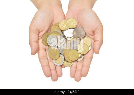 Geben Sie einen Stapel von Münzen mit beiden Händen Stockfoto