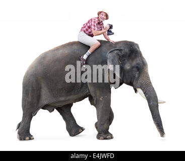 fröhliche Touristen reitet auf einem Elefanten eine Kamera Stockfoto
