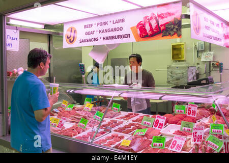 Melbourne Australien, Queen Victoria Market, Verkäufer Stände Stände Stand Markt Markt, Käufer kaufen verkaufen, verkaufen, Transaktion zahlen BU Stockfoto