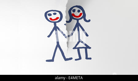 Ein weißes Blatt Papier reißen in zwei durch ein Kind wie Skizze von Mann und Frau, die Hand in Hand Stockfoto