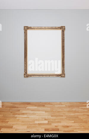 Leere Wand-Interieur mit einem leeren Rahmen Stockfoto