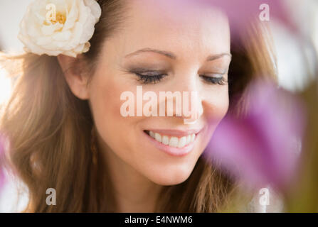 Frau mit Blume Stockfoto