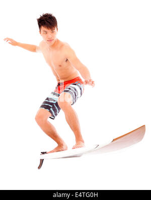 junge Surfer Praxis Surfen pose Stockfoto