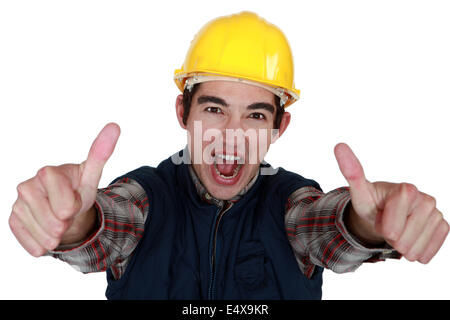 Builder geben Daumen-hoch-Geste Stockfoto