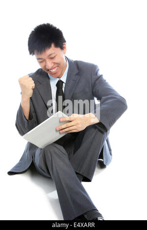 Asiatische Geschäftsmann feiert Stockfoto
